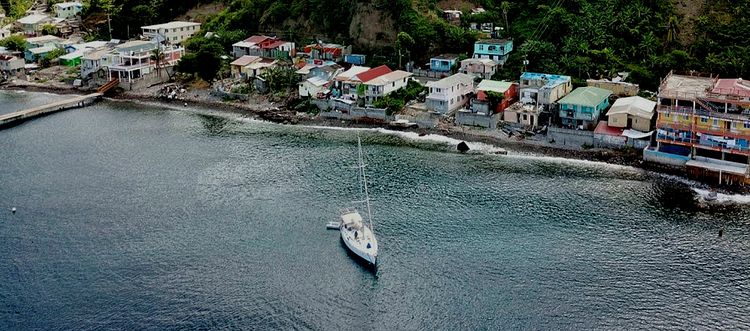 Yachts mooring at the buoys on Roseau roadstead