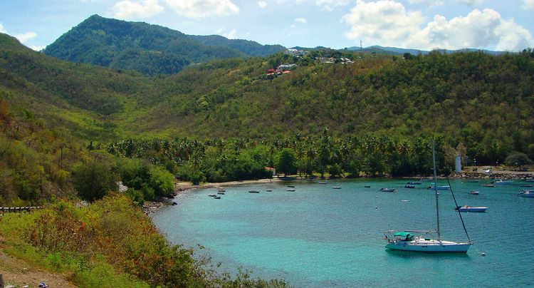 Yacht moorings on buoys and anchors in Barque Bay (Anse a la Barque)