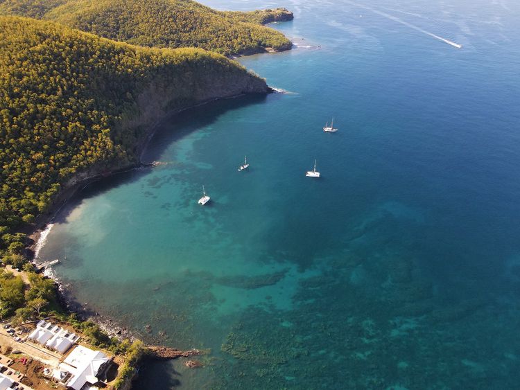 Yacht anchorage in the Chaude du Cure bay 