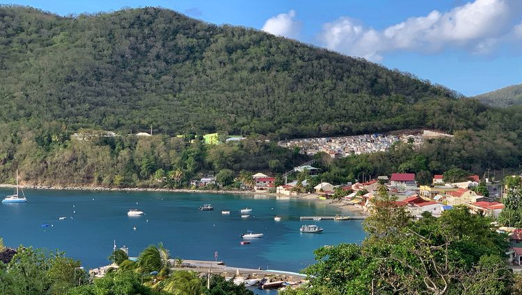 Yacht moorings on buoys and anchors in Deshaies Bay (Anse Deshaies)