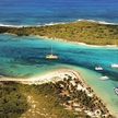 Yacht mooring on the buoys in the Petite Terre Reserve