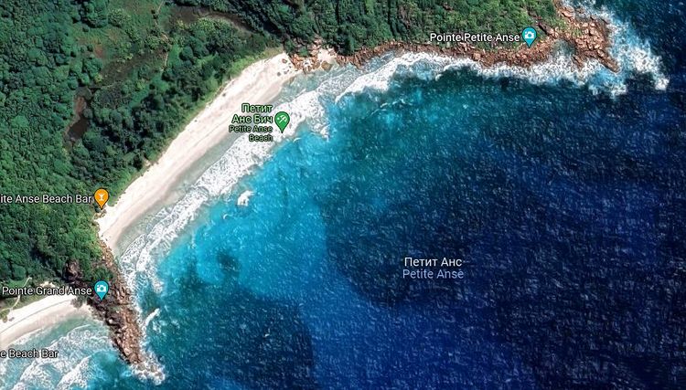 Anchorage of yachts in the Petite Anse on the photo from space