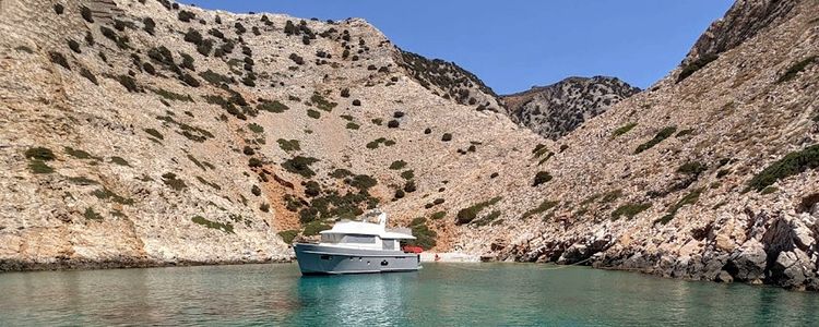 Yacht mooring in the Yaloudia cove