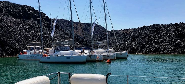 Yacht mooring on the south-west of Nea Kameni Island near hot spring