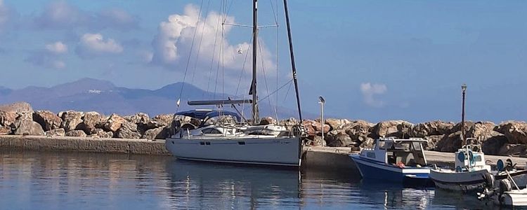 Yacht mooring in Agios Antonios fishport on the island of Tilos