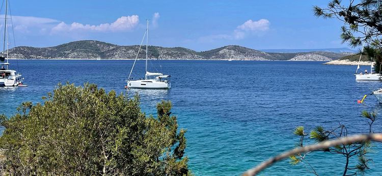 Yacht mooringse in Vlaka Bay at Sveti Klement Island