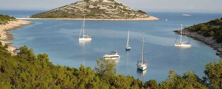 Yachts on mooring buoys in Stupica Mala Bay on Zirje Island