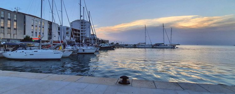 Yacht mooring at the city waterfront of Umag