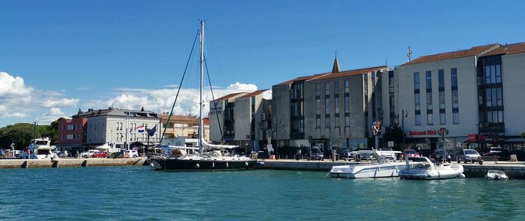 Yacht mooring at the city waterfront of Umag