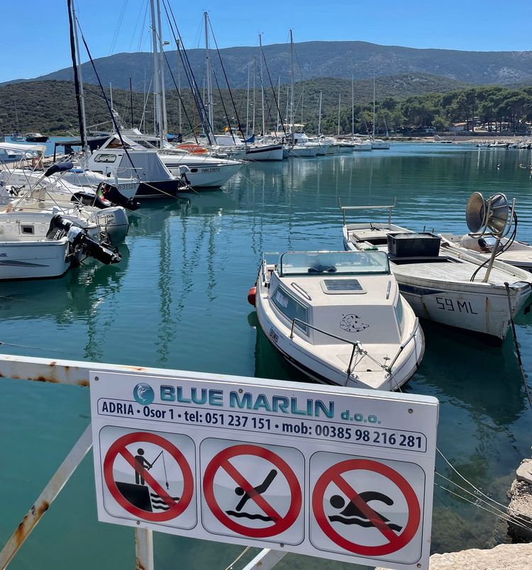 Yachts in the marina on the south side of the Osor Canal