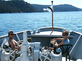 Outdoor seating is available during fair weather cruising or while the boat is docked or anchored. Large open areas on the forward deck or on the upper (boat) deck provide ample room for enjoying the outdoors. The afterdeck makes a beautiful seating area for relaxing or dining on pleasant evenings.