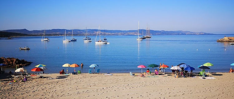 Yacht anchorage at the entrance to Isola Rossa marina