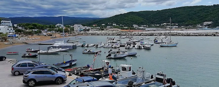 Yacht mooring on buoys in Pesсichi harbor