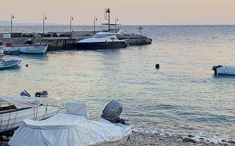 Yacht mooring at the pier in the south-west of San Nicola Island